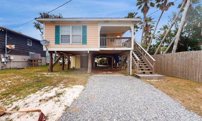 Fort Morgan Pines House | Dog-friendly waterfront retreat with a washer/dryer, AC, patio, & outdoor shower