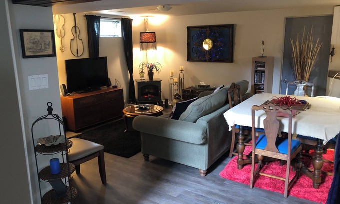 Township of Woolwich Apartment | Doggy heaven. Large fenced yard , beautiful gardens, guest patio and firepit.