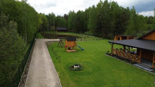 Bilgoraj Apartment | Dom nad stawem