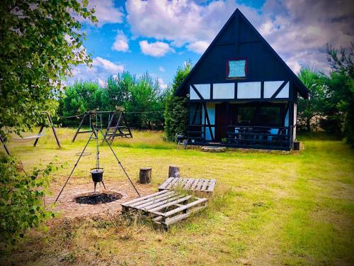 Ostrowo Cabin | Domek letniskowy z kortem tenisowym Karwia Ostrowo