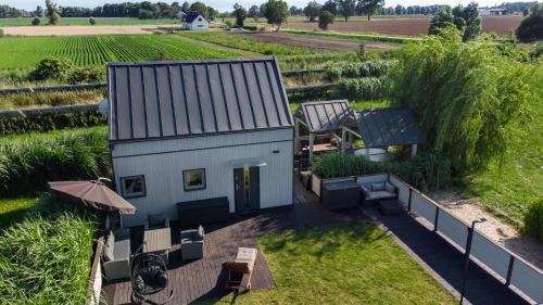 Elblag House | Domek z jacuzzi na Folwarku Żuławskim