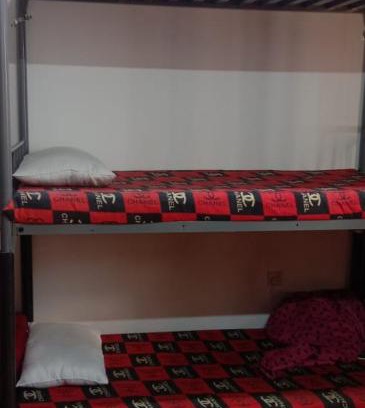 Sharjah House | Dormitory bed space in a shared room