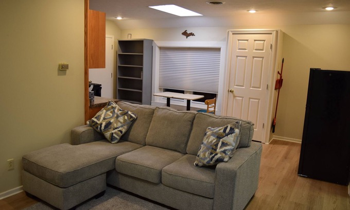 Escanaba Apartment | Downtown Escanaba Gem: Spacious Extended Stay Rental Above Commercial Space!