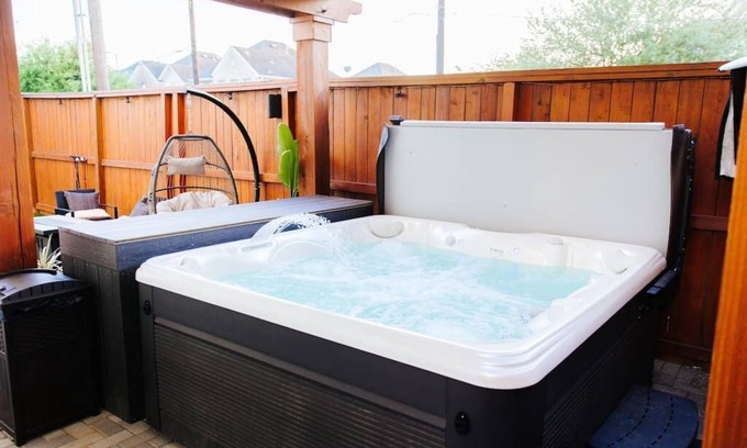 Northside House | Downtown Escape with Backyard, Gameroom and Hot Tub