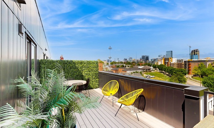 Rolling Mill Hill Condo | Downtown Nashville rooftop studio condo with city views and private balcony