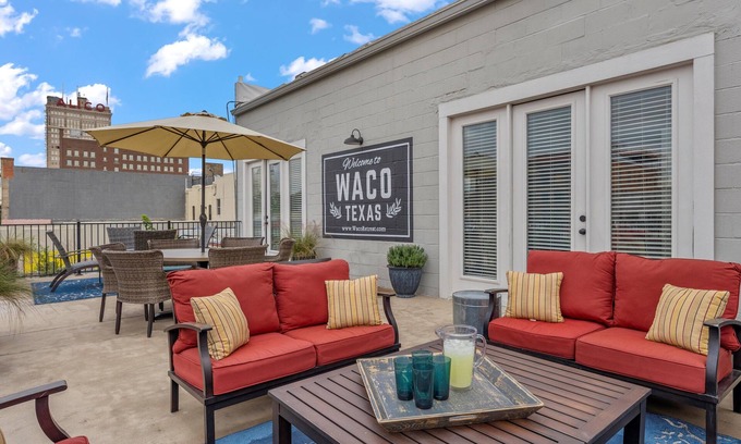 Brazos Condo | Downtown Waco retreat! 2 blocks to Magnolia Silos! Huge private balcony!