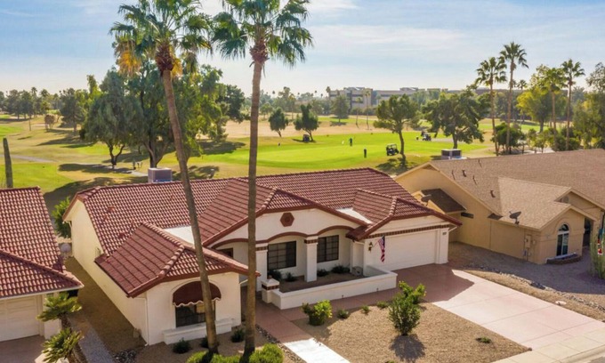 Sun City West House | DREAM RETREAT in Sun City West on a golf course with practice green.