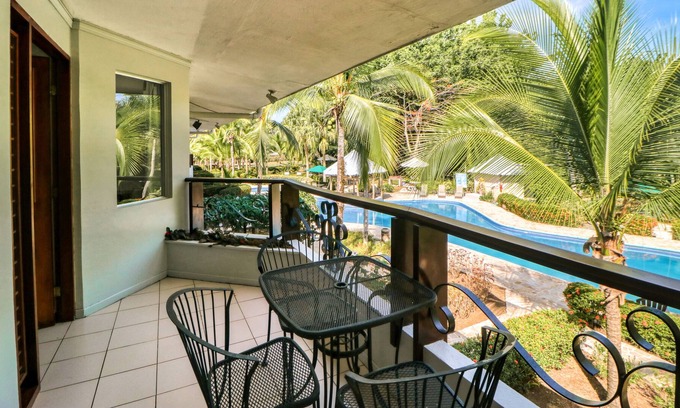 Damas Apartment | Dreamy tropical gem with pool, lush gardens, private patio, & WiFi