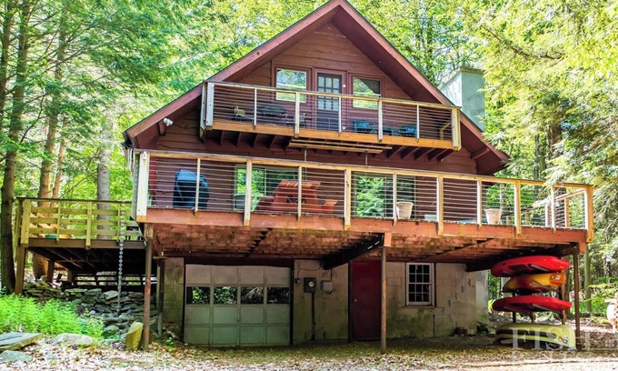 Laporte Cottage | Dual deck overlooking the lake at "Serenity" cottage in Lake Mokoma