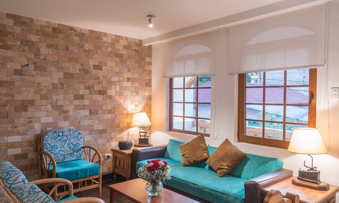 Banos de Agua Santa Apartment | Duplex Apartment. 5 rooms in downtown Baños - Casa del Balcon