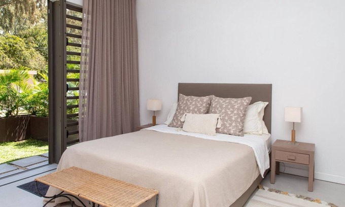 Roches Noires Apartment | Duplex apartments with direct access to an almost private beach
