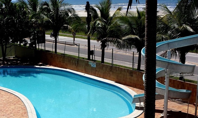 Boraceia Apartment | Duplex penthouse facing the sea / front of the saw, building in front of the sea