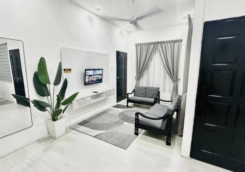 Peringat House | DVillage Homestay Kelantan Kota Bharu Free Wifi Bilik Aircond