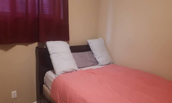 Timberlea Apartment | Eazi Peach Bedroom Su