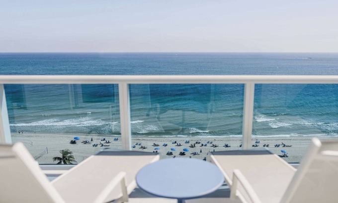 Central Beach Hotel | Elegant Balcony Room Overlooking Beach Near Pier Fishing and Art Walks