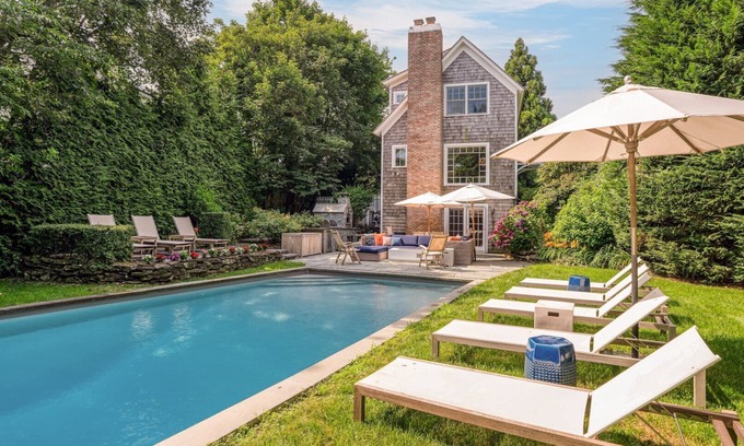 Water Mill House | Elegant Coastal Escape with Expansive Yard, Heated Pool, and Outdoor.