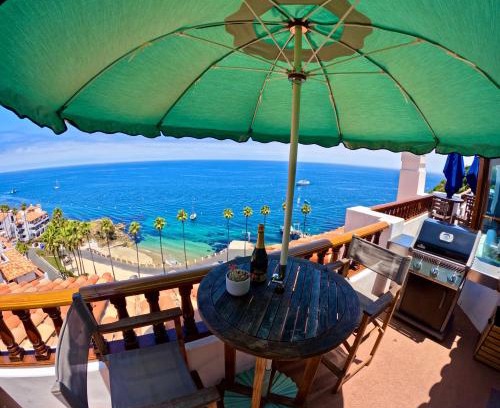 Avalon Villa | Elegant Condo W Hot Tub & Patio