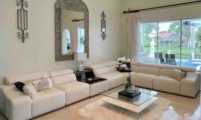 Coral Springs House | Elegant home private pool private patio bar with TV on lake