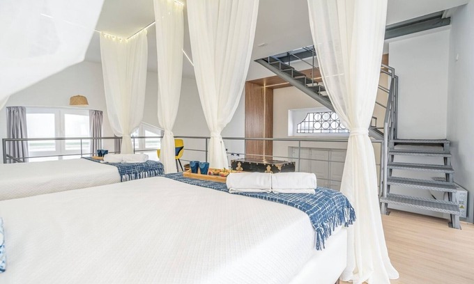 Portel House | Elegant Loft with Historic Charm and Terrace