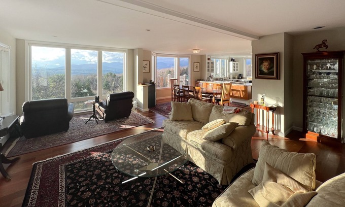 Waterbury Center House | Elegant & renewed mountain-view home with private hot tub, large deck & backyard