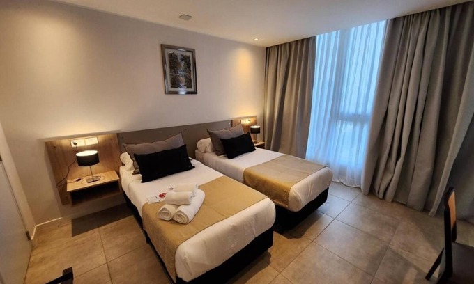 Rio Cuarto Hotel | Elegant Stay Near Plaza Estrada With Outdoor Pool Free Breakfast And Parking