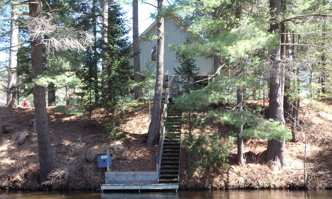 Grayling Cabin | Elysian River Escape: Autumn Bliss on the Manistee River – A Fly-Fisherman's Dream