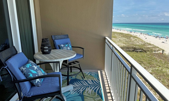 Panama City Beach Condo | Emerald Beach 4th Fl. Beachfront Balcony. Family Friendly. Food. Bar. Starbucks.