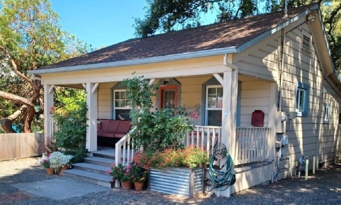 Burbank Gardens Neighborhood Association Cottage | Enchanting Bohemian Cottage for Two,enjoy the cool patio under ancient oaks