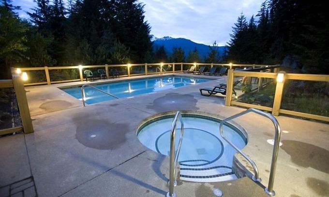 Nordic Estates Condo | Enchanting mountainside Ski In/Out french lodge style home pool hot tub