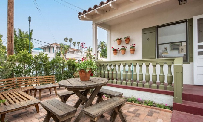 West Beach Apartment | Enjoy indoor-outdoor living, a full kitchen, and vintage coastal charm.