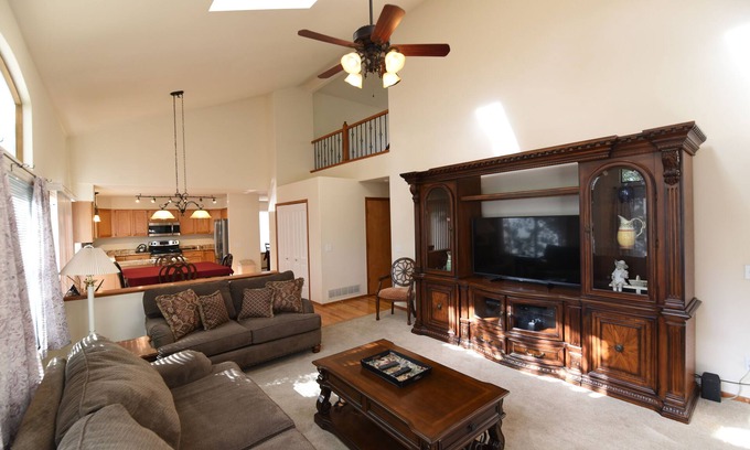 Northeast Colorado Springs House | Enjoy the large patio and shaded back yard of this large home with 2 kitchens
