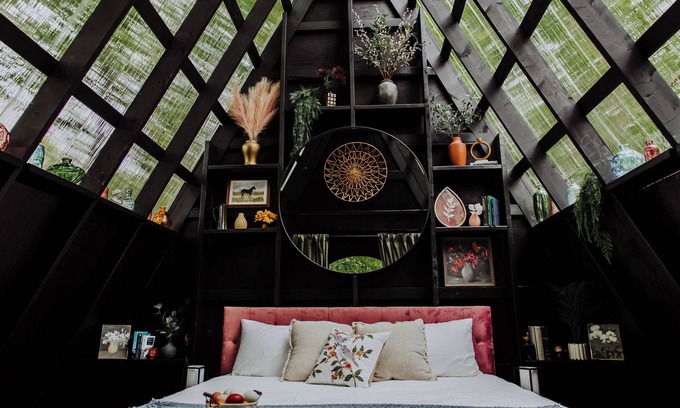 Fennville RV Rental | Enjoy the simplicity and elegance of a cozy bedroom in the woods.