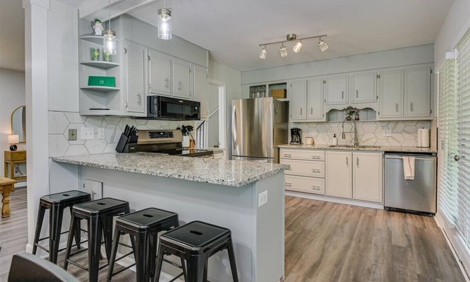 National Hills House | Entire Home in great Augusta National Hills neighborhood w/screened in porch