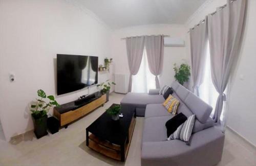 Irakleio Apartment | Ηome & Garden with parking close to Olympic Stadium