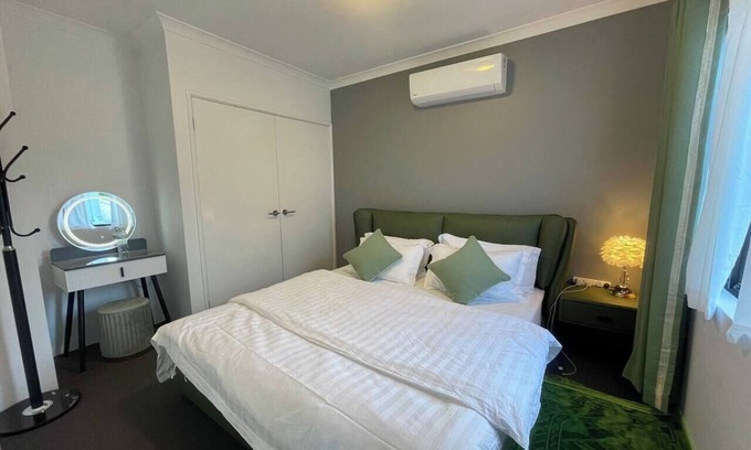 Victoria Park House | Equitice Spring Serene King Bedroom
