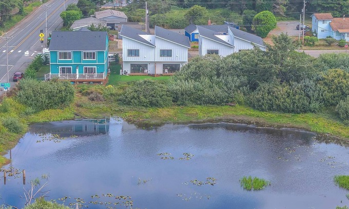 Rockaway Beach House | Escape to a cozy, modern lake house with beautiful Oregon views.