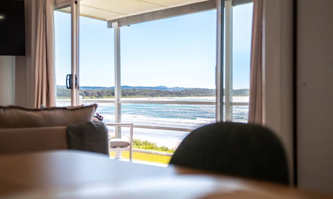 Arrawarra Headland House | Escape to Salastraf, a stunning 3-bedroom retreat offering breathtaking views of the marine park and