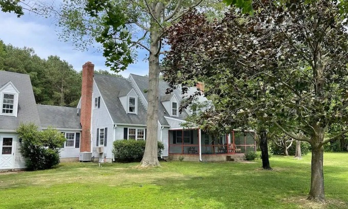 Cambridge House | Escape with family or friends to this peaceful, 4-bedroom retreat on the water