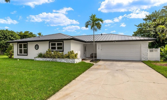 Shell Harbor House | Exceptional canal front home, beautiful design, steps to beach!