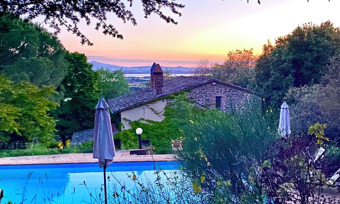 Passignano sul Trasimeno Villa | Exclusive hideaway nestled in woods with stunning lakeview Tuscany/Umbria border