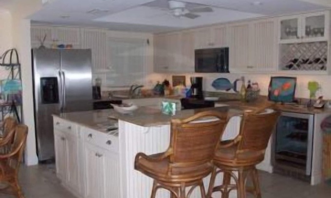 New Smyrna Beach Condo | Exclusive third floor three bedroom three bath end condo!