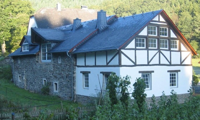 Beuren House | Exclusively renovated, romantic, old mill with a wooden water wheel