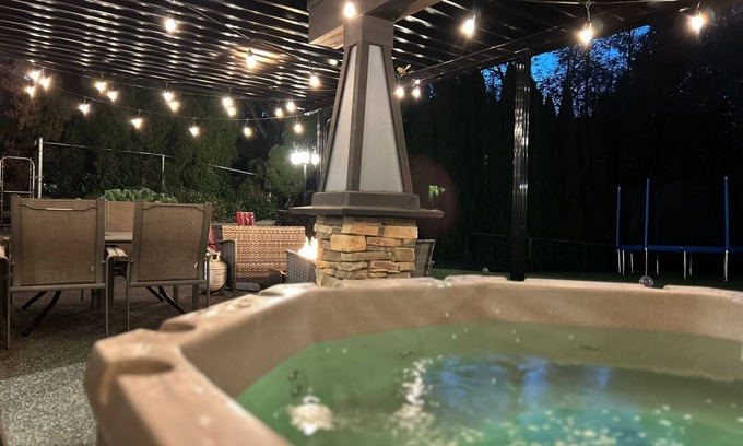 Walnut Grove House | Executive 3 bedroom suite with theater room & hot tub on a park-like property.