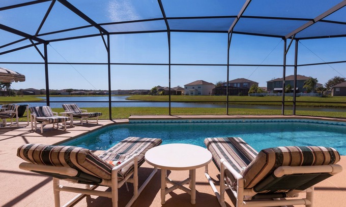 Crescent Lakes Villa | Executive 4 bed 3 bath villa, lake view, large pool with spa 30 mins from Disney