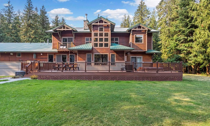 Clark Fork House | Expansive Riverfront Lodge with Dock, Game Room, Bar & Spacious Deck!