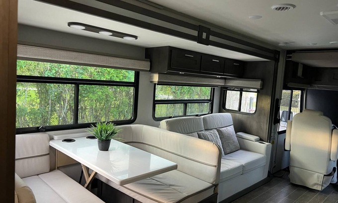 Parkland House | "Experience Enchantment: Book Your Dream Stay at The Magic Motor Home Today!"