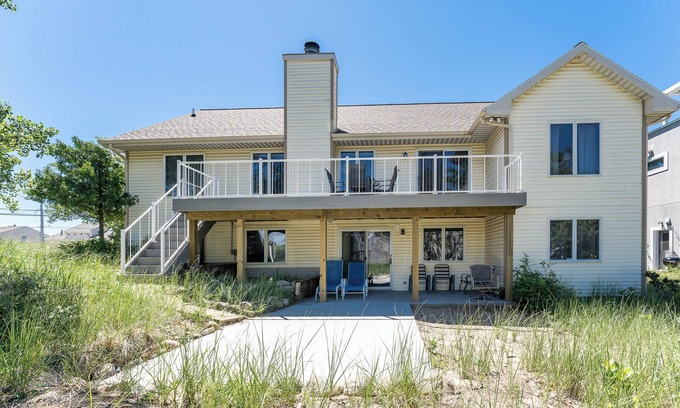 Spring Lake House | Experience lakeside luxury at Sunset Cove, a spacious 5-bedroom home