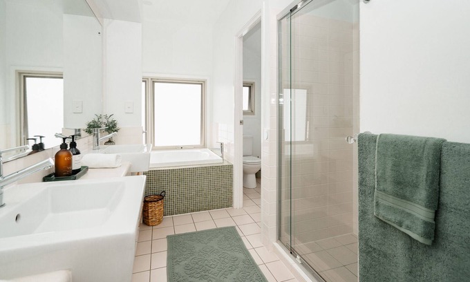 Mudjimba Apartment | Experience the epitome of luxury beachside living in this stunning home.
