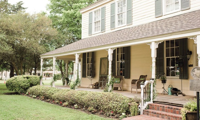 Montgomery Bed & Breakfast | Experience the historic Suite Louise with a parlor and claw tub.