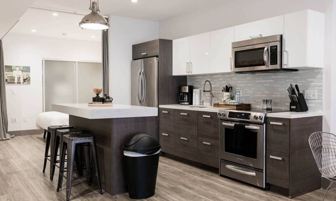Historic Core Apartment | Exposed Brick Loft-Style Space | Private Balcony!
